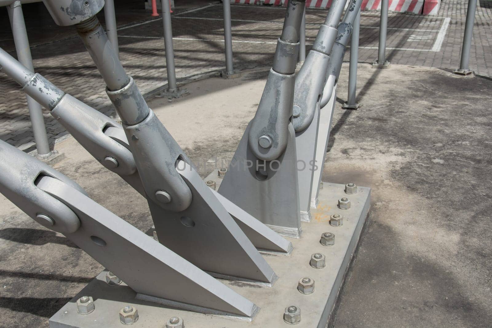 Steel column support with bolts and nuts.