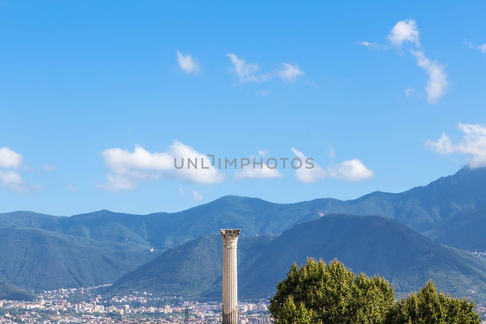 Pompeii in Italy, ruins of the antique Temple of Apollo with bronze Apollo statue, Naples.