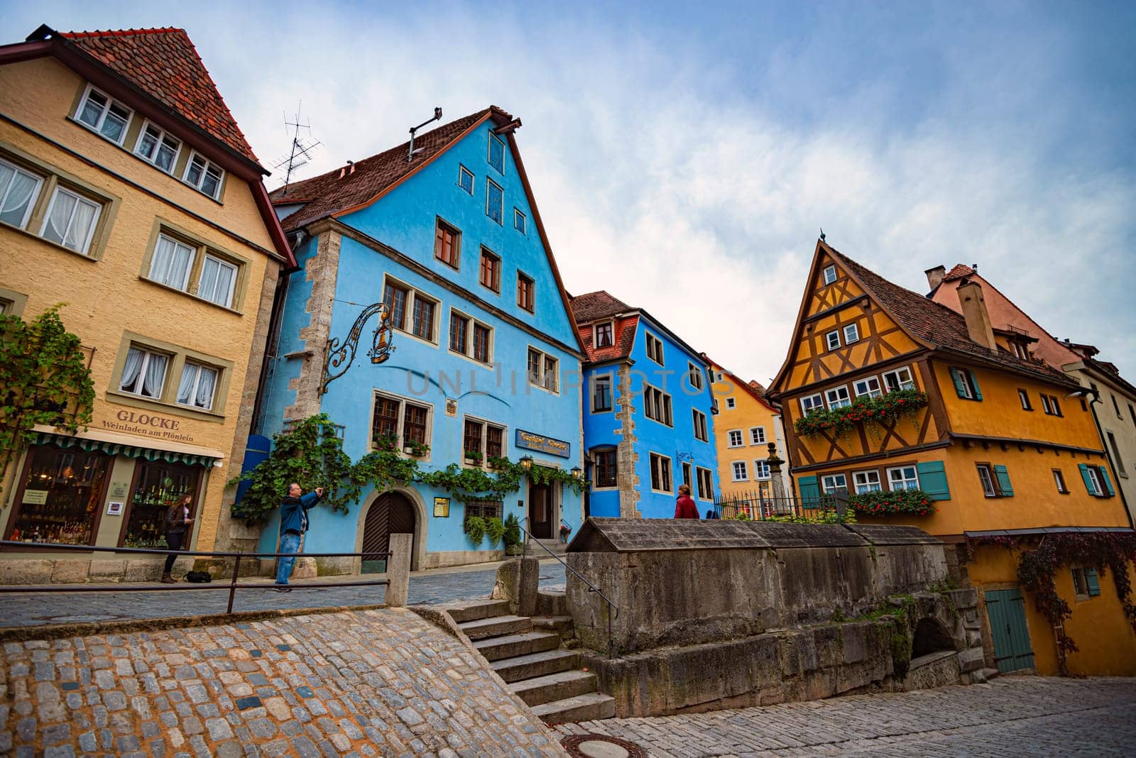 Rothenburg Ob Der Tauber, Germany - SEPTEMBER 24, 2014: View on old city street with traditional architecture of Rothenburg Ob Der Tauber, Bavaria, Germany, Europe