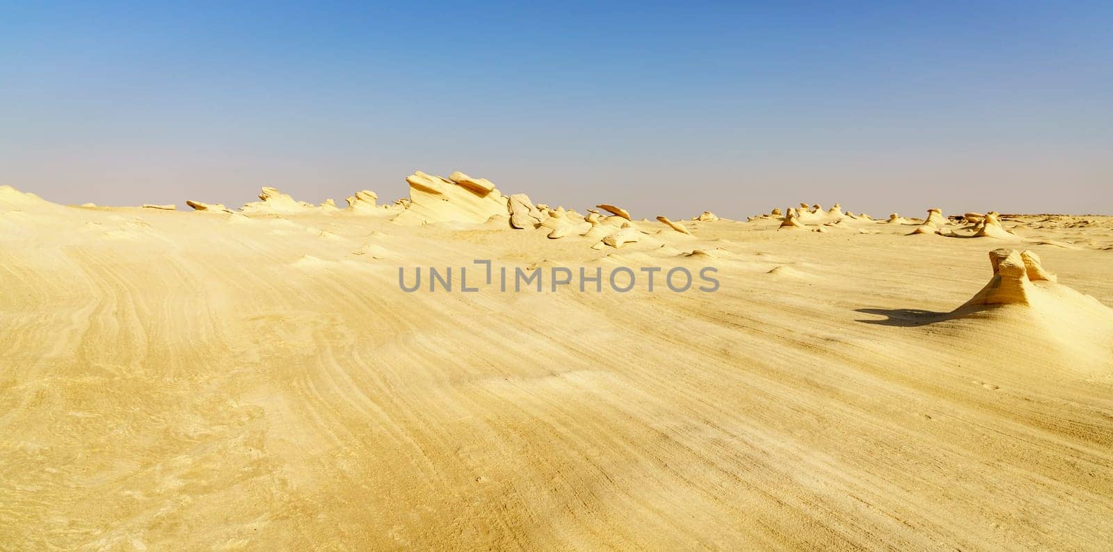 Sandstone formations in Abu Dhabi desert in United Arab Emirates