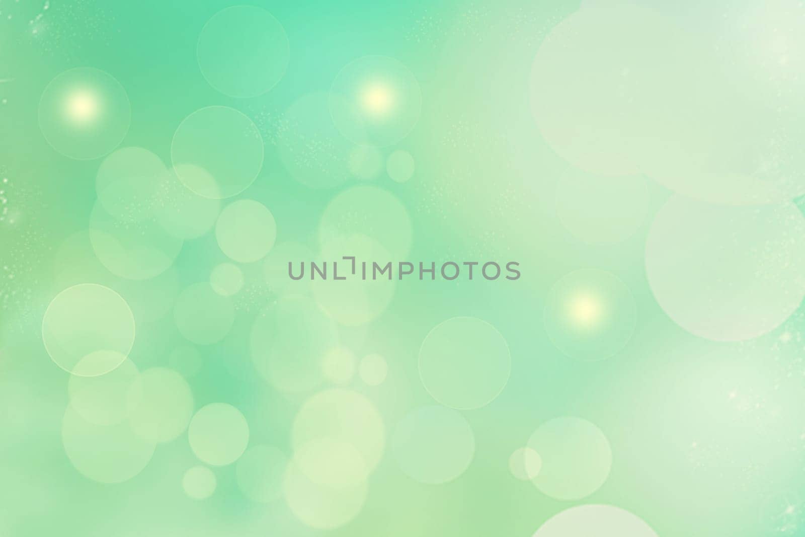 Abstract gradient green light turquoise shiny blurred background texture with circular bokeh lights. Beautiful backdrop. Space for design.