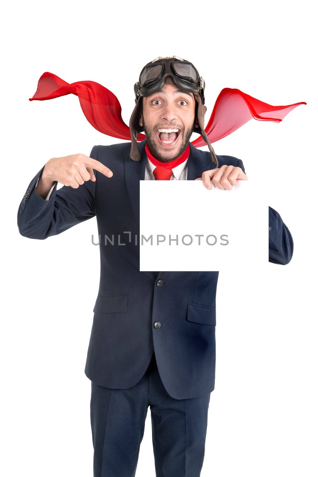 Businessman with pilot goggles and white board isolated in white