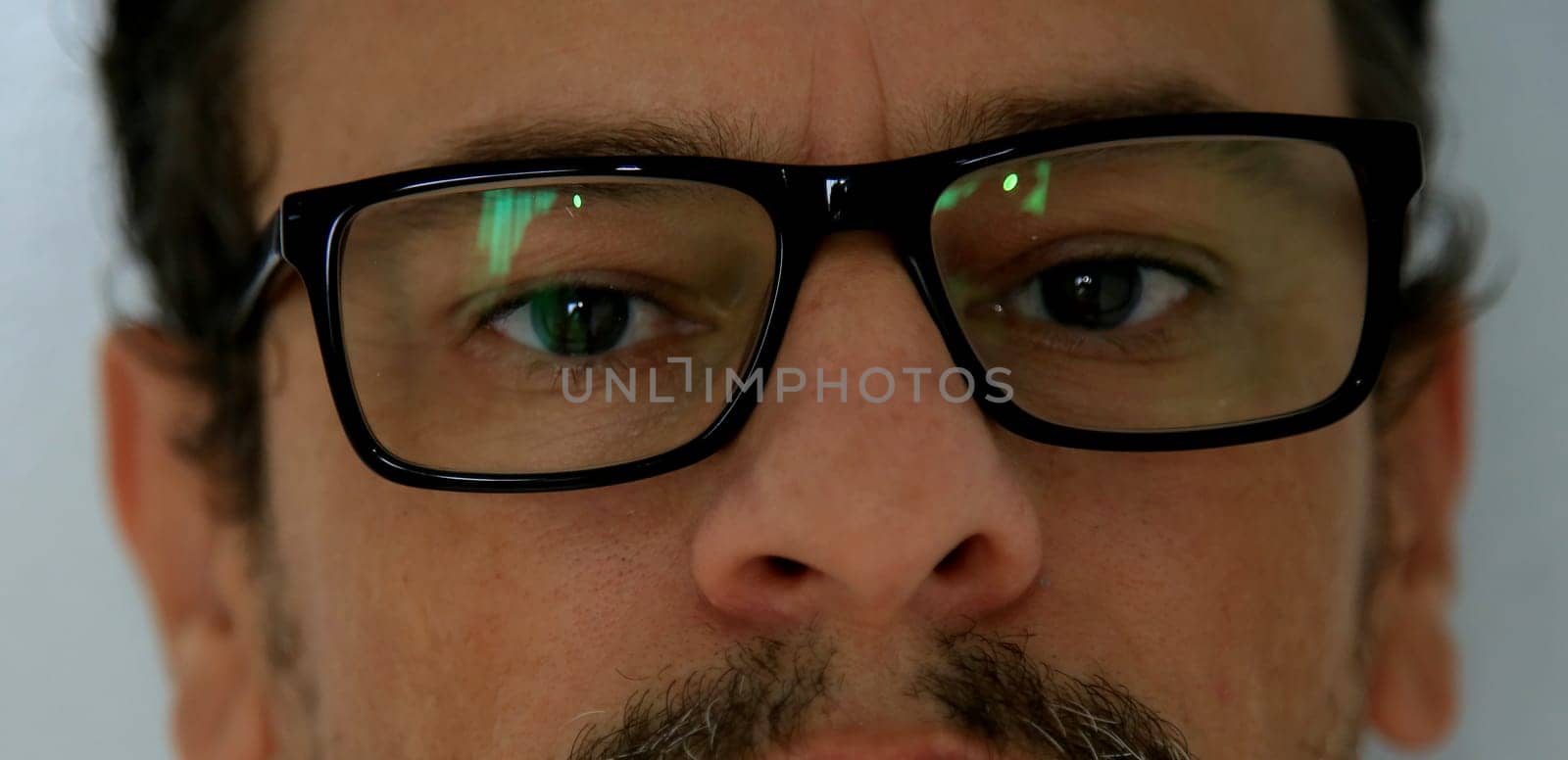 salvador, bahia / brazil - may 21, 2020: person is seen holding eyeglasses close to the face...