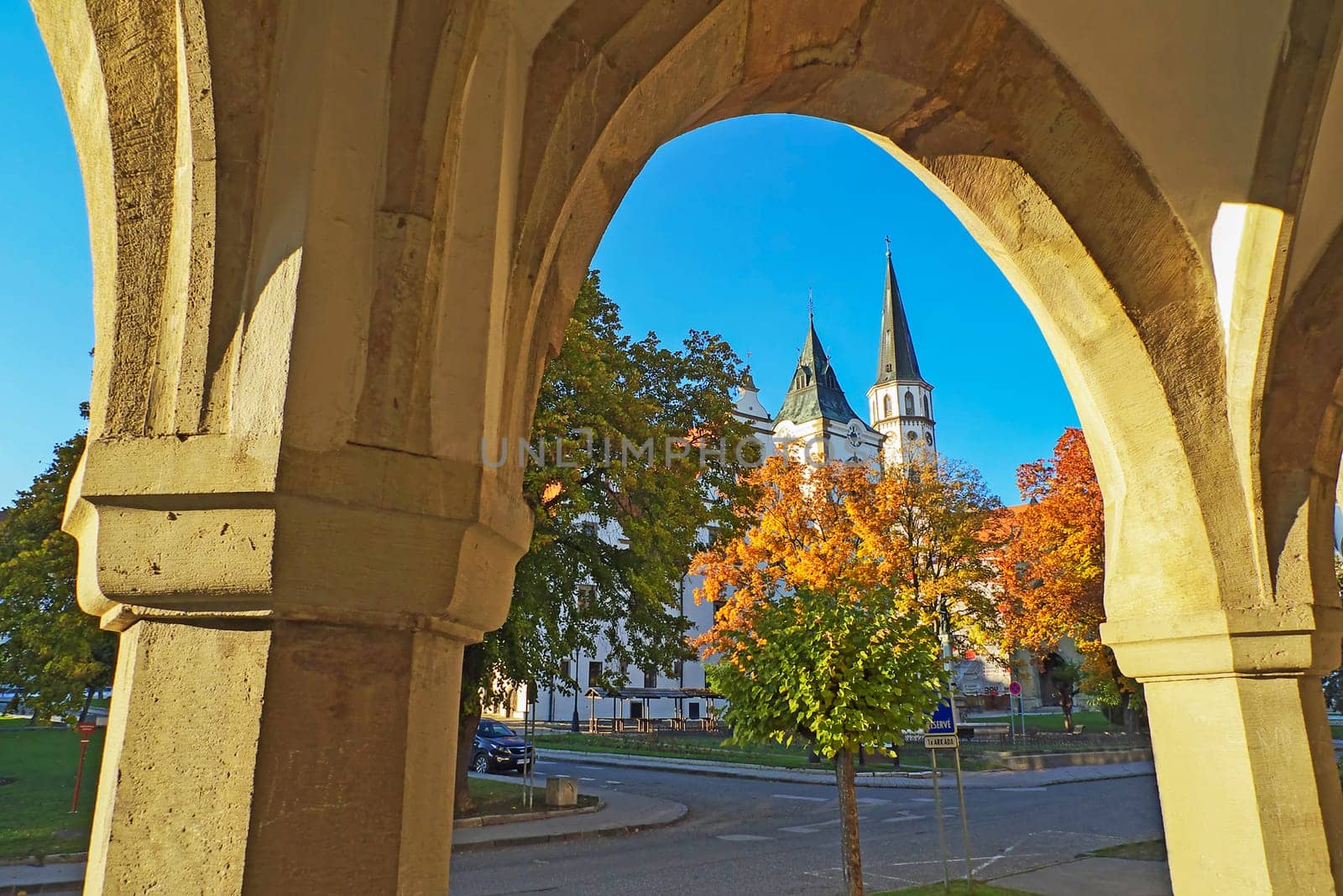 Medieval town square with city hall and church