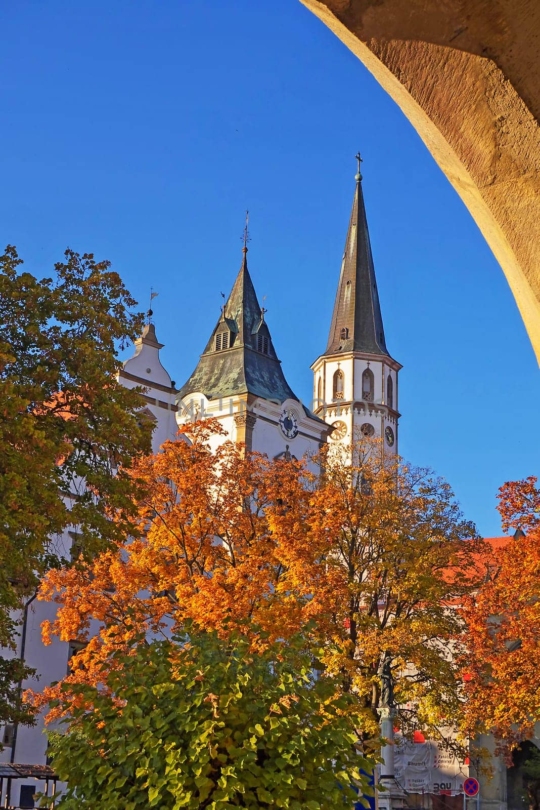 Medieval town square with city hall and church