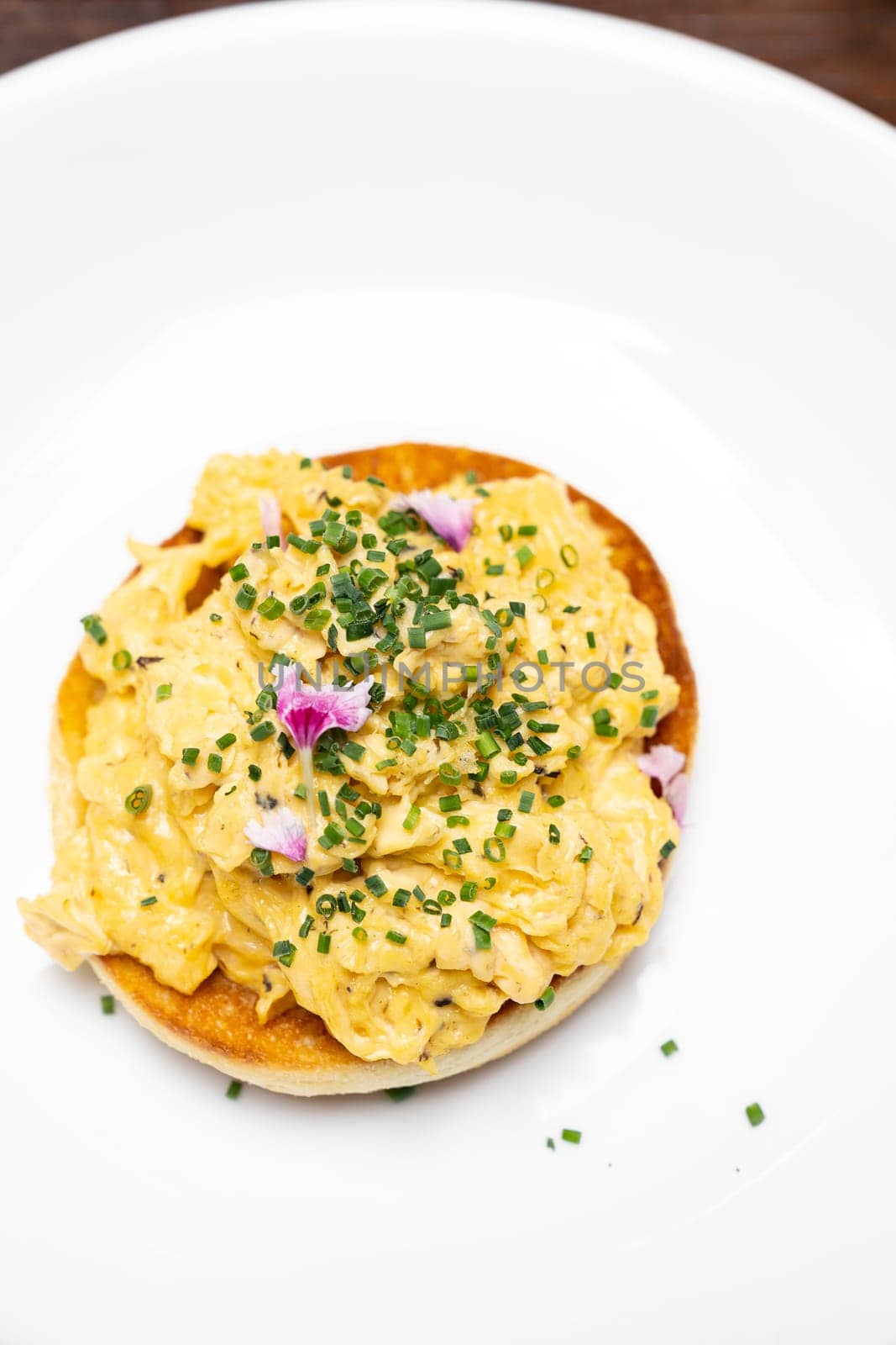 Scramble Egg with Truffle mushroom oil, international gourmet cuisine traditional breakfast of europe. Restaurant gastronomy food and drink consumerism concept.