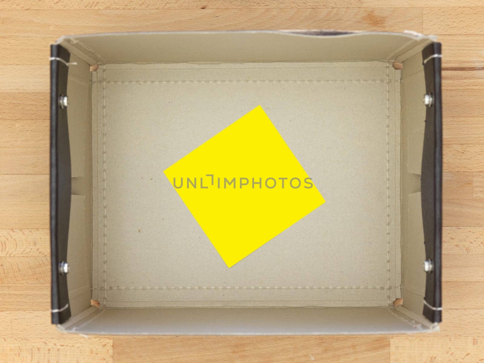 Storage boxes isolated on a wooden shelf