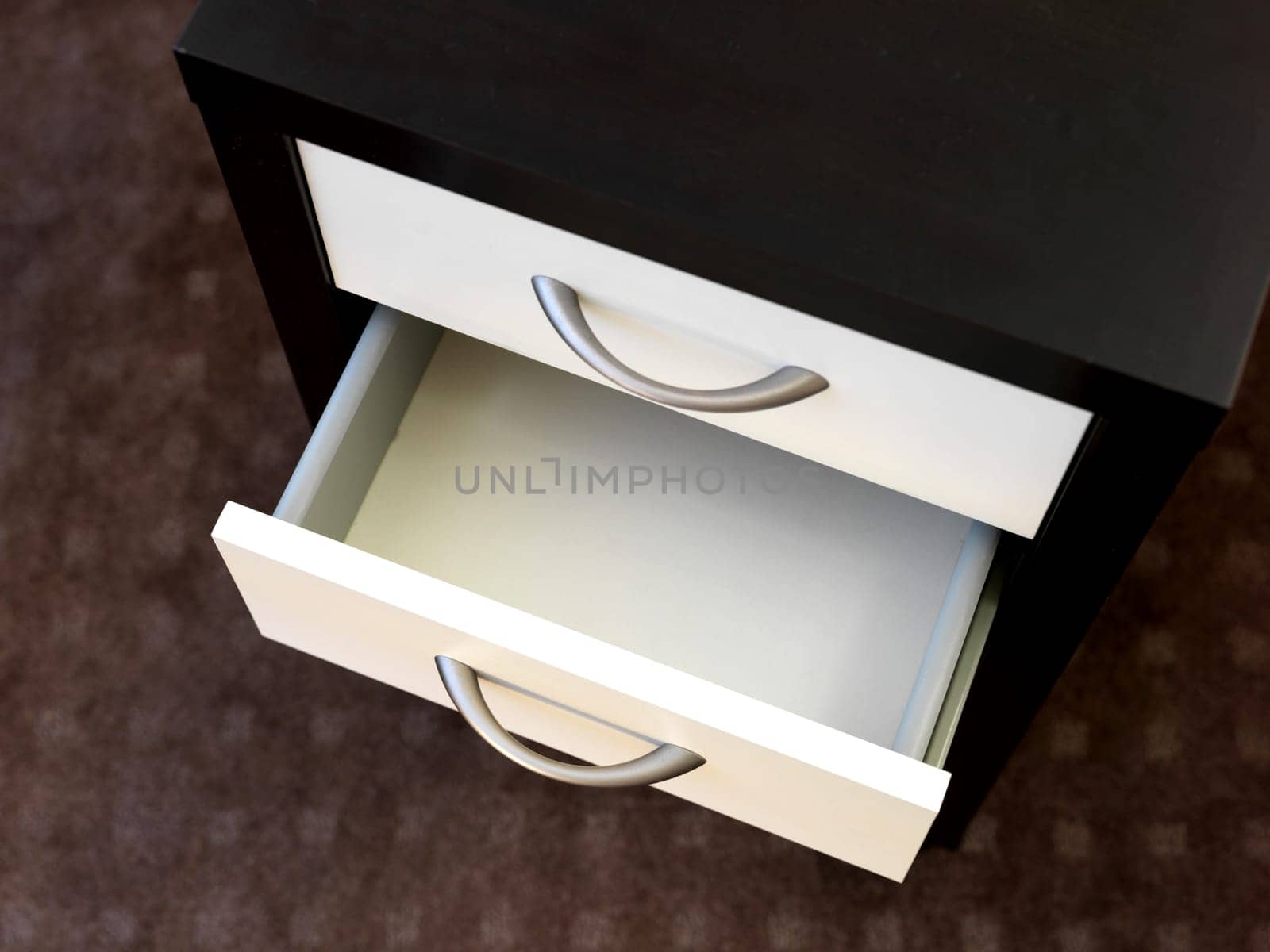 A close up shot of a set of office drawers