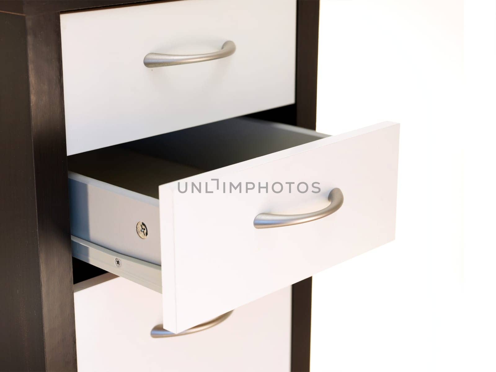 A close up shot of a set of office drawers