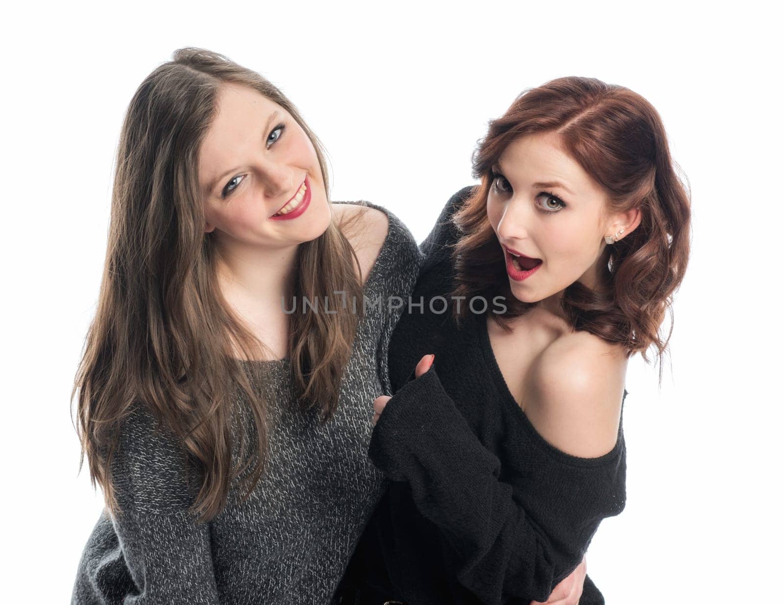Two girls flirt and show thumbs up