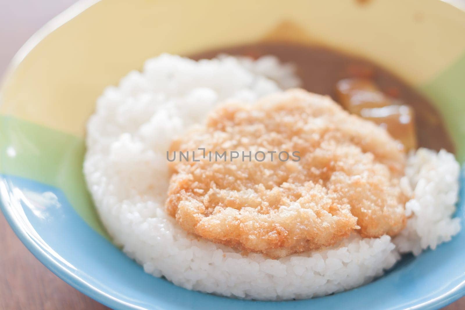 Fried pork top on rice, stock photo