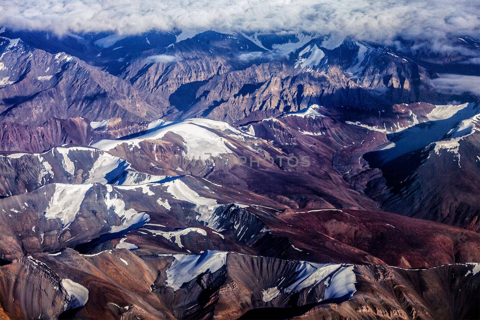Himalayas mountains aerial view with clouds