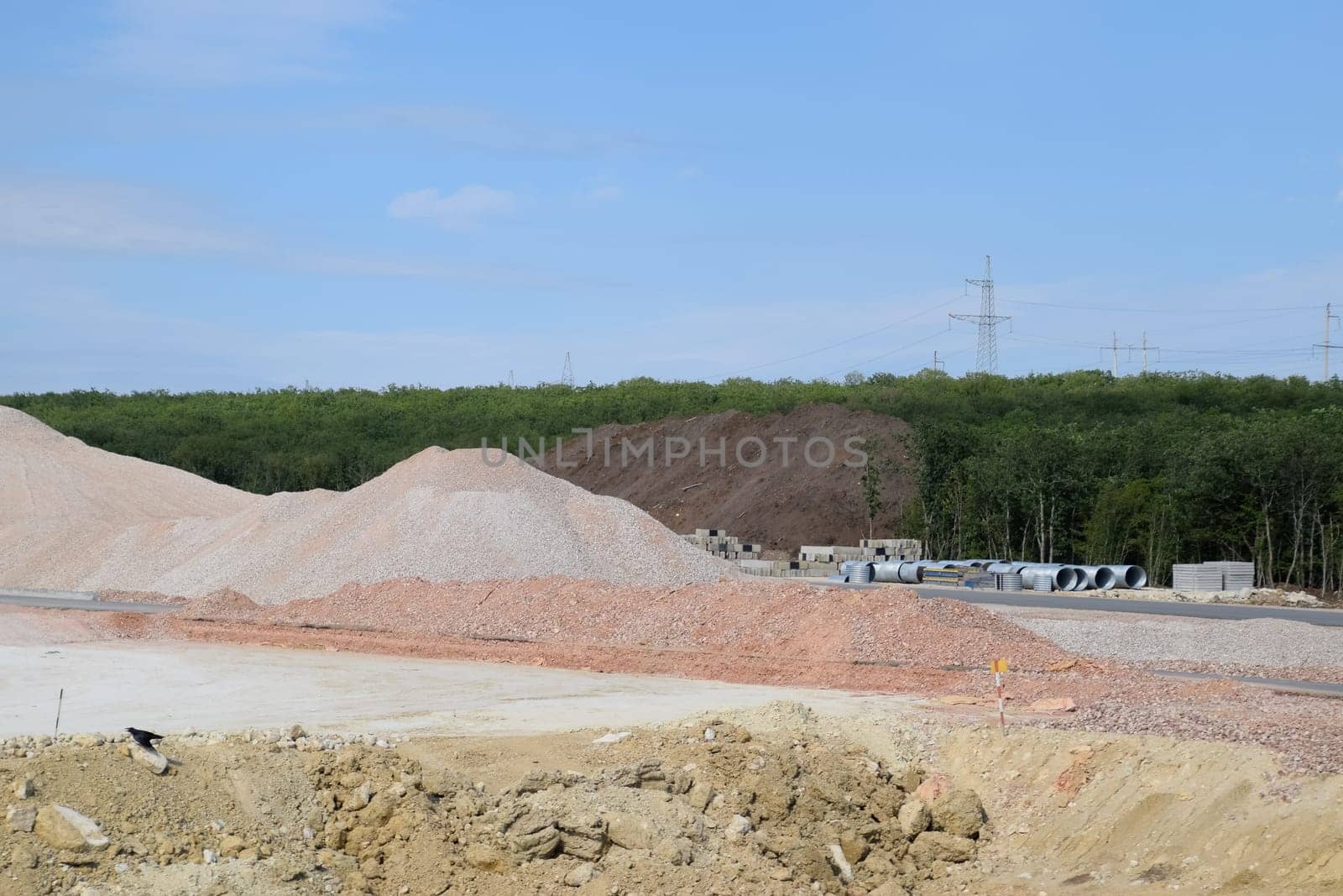 Construction of a new road and transport interchange. Work on reinforced concrete structures and road surface.