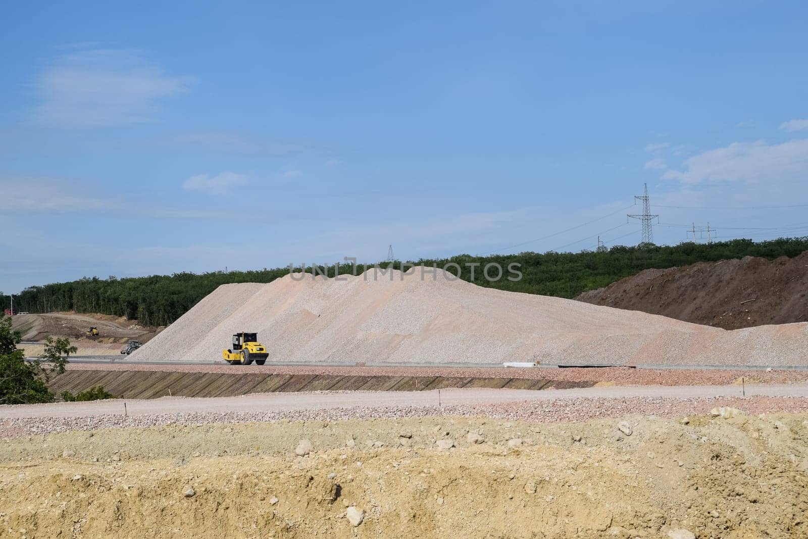 Construction of a new road and transport interchange. Work on reinforced concrete structures and road surface.
