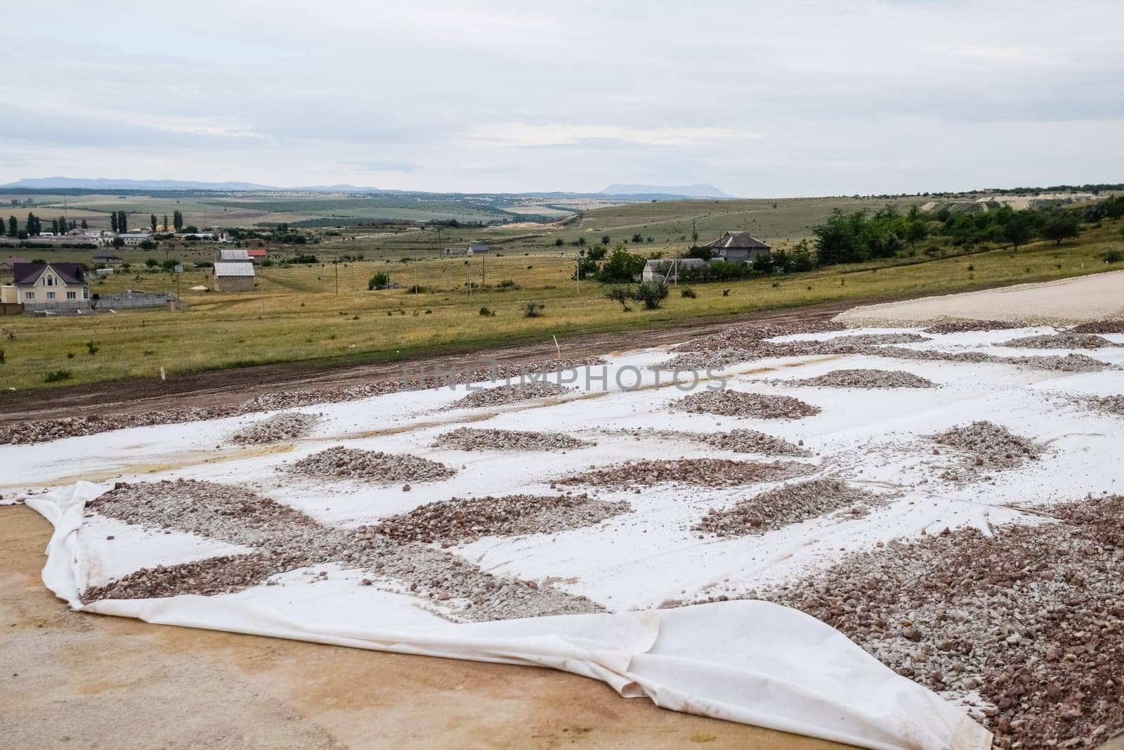 Construction of a new road and transport interchange. Work on reinforced concrete structures and road surface.