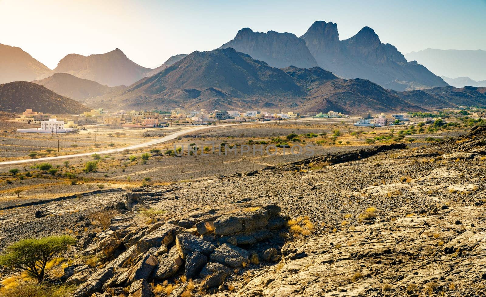 View of Hajar Mountains and a small village near Al Hoota cave in Oman