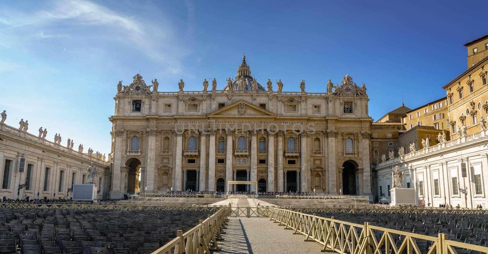 Rows of empty seats in front of St. Peters Basilica in Vatican City, Rome, Italy