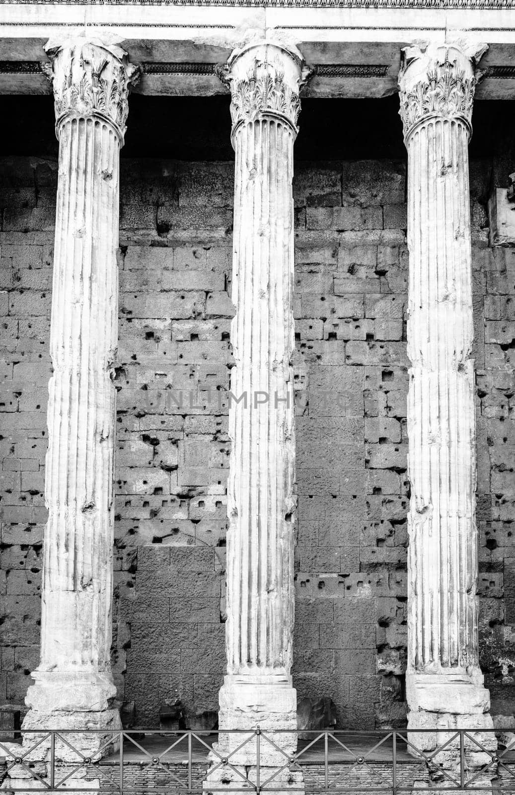 Fragment of facade of Temple of Hadrian in Rome, Italy