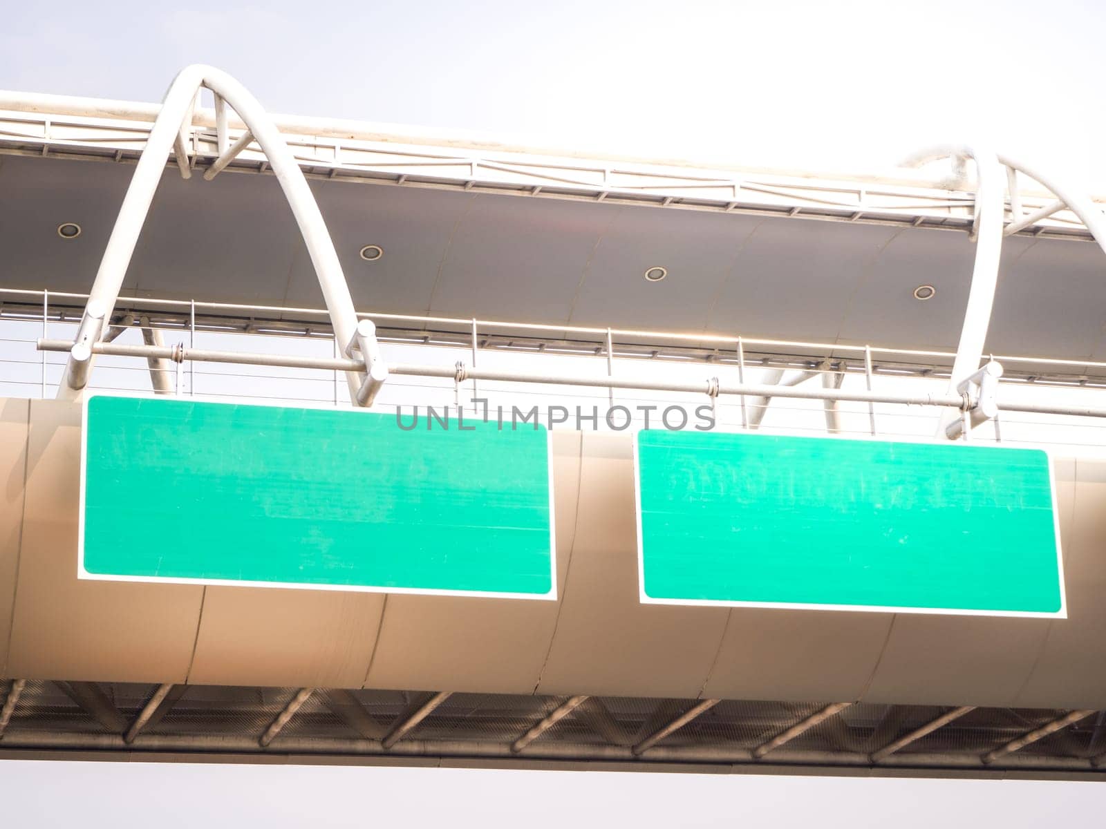 Green background labe on the bridge and blue sky background
