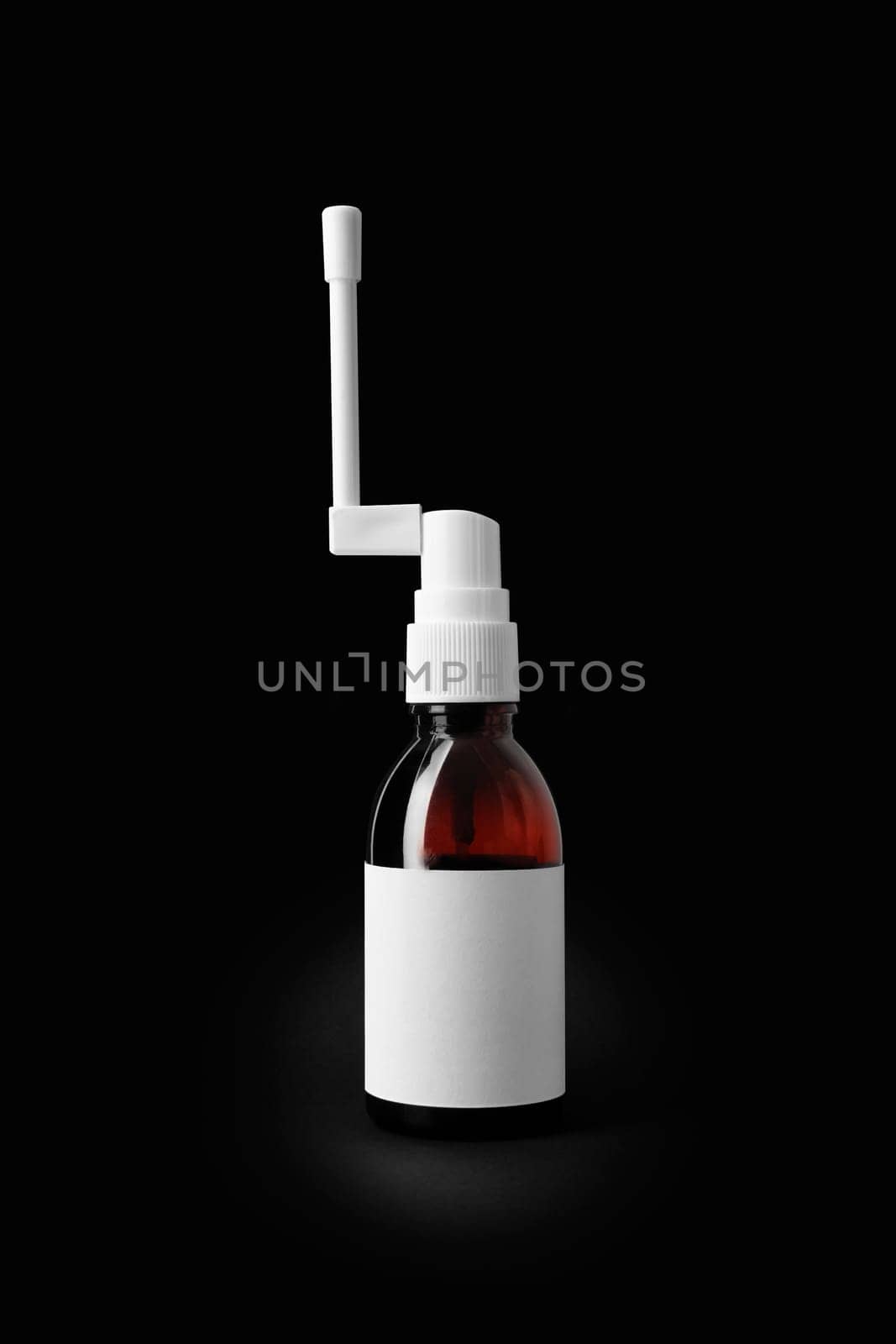 Throast spray medicine isolated on black background. With clipping path