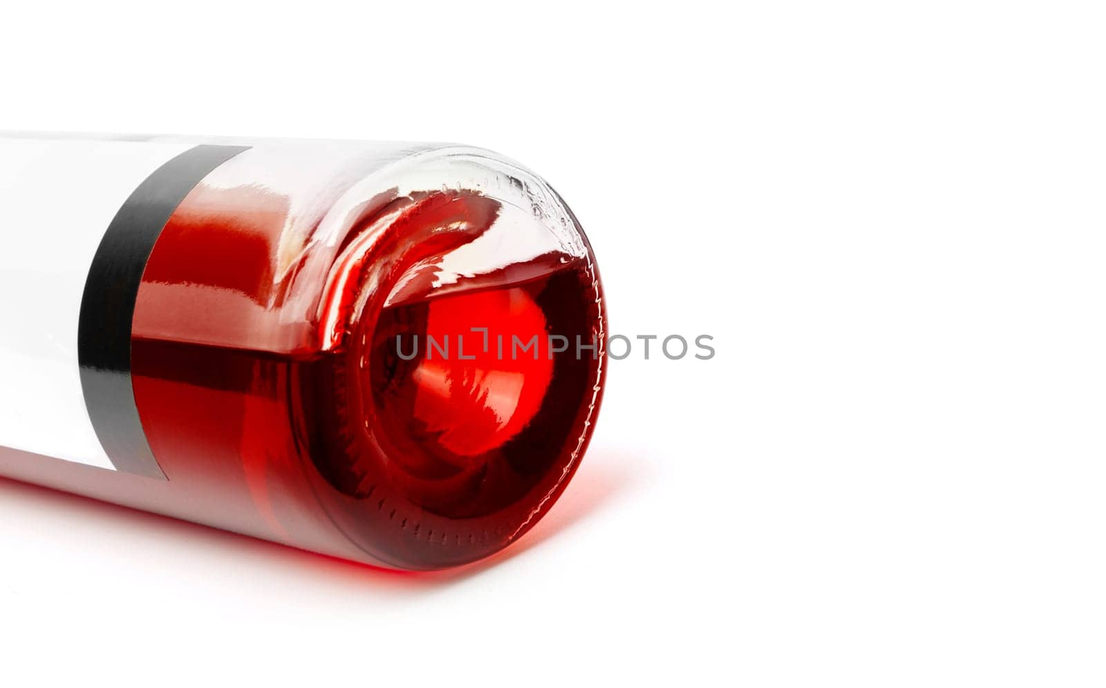 Closeup of a red wine bottle on a white background. With clipping path