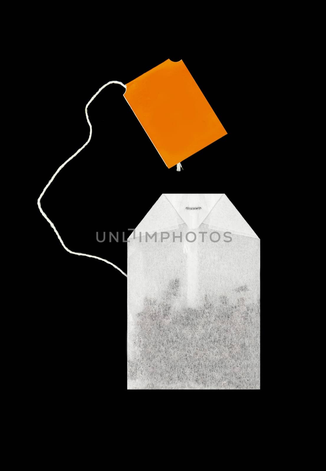 Close-up of herbal tea bag isolated on black background