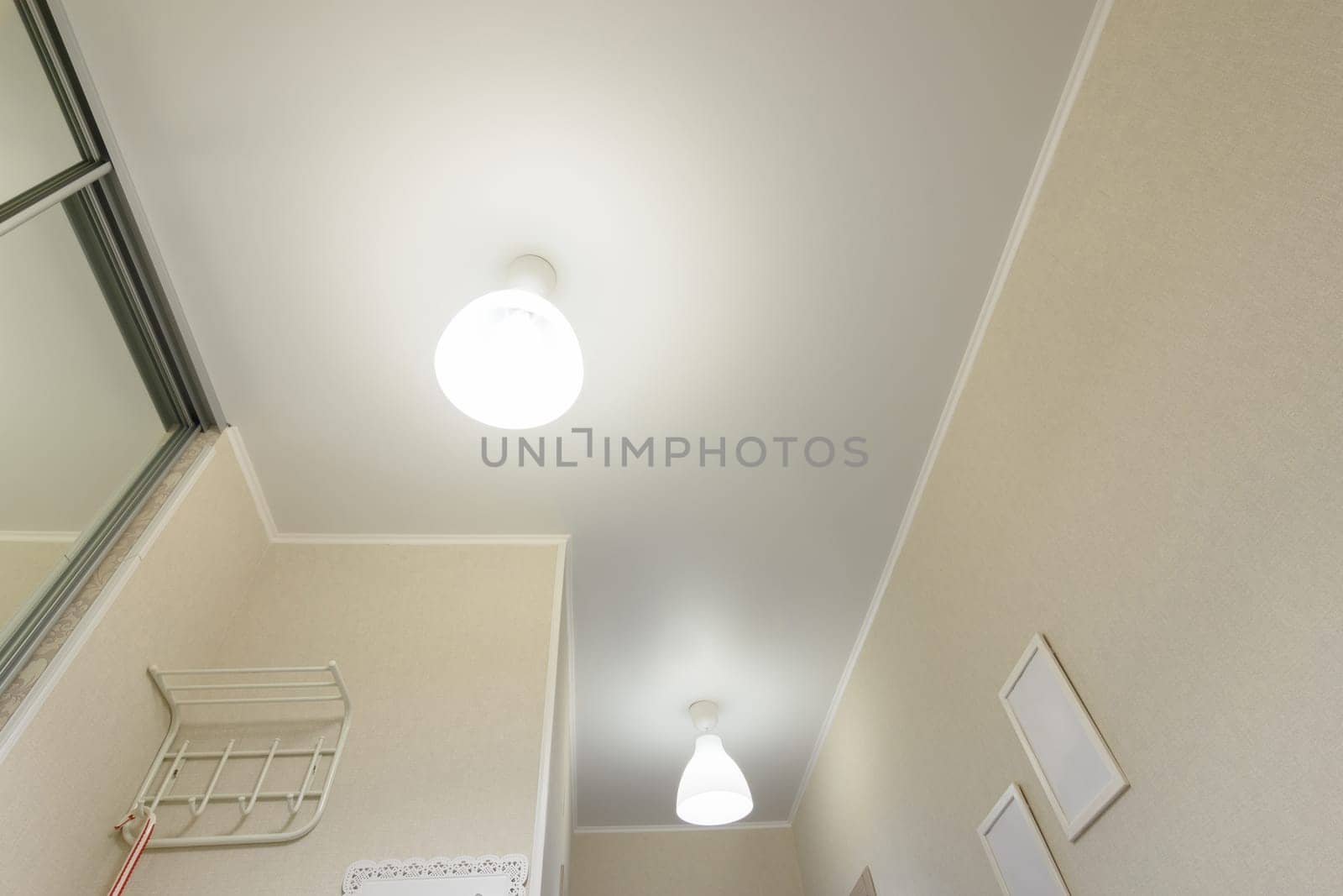Stretch ceiling in the hallway in the apartment