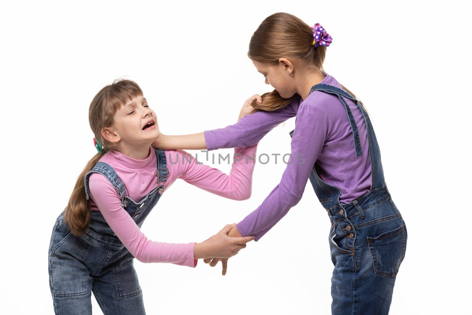 Two girls fight and hurt each other