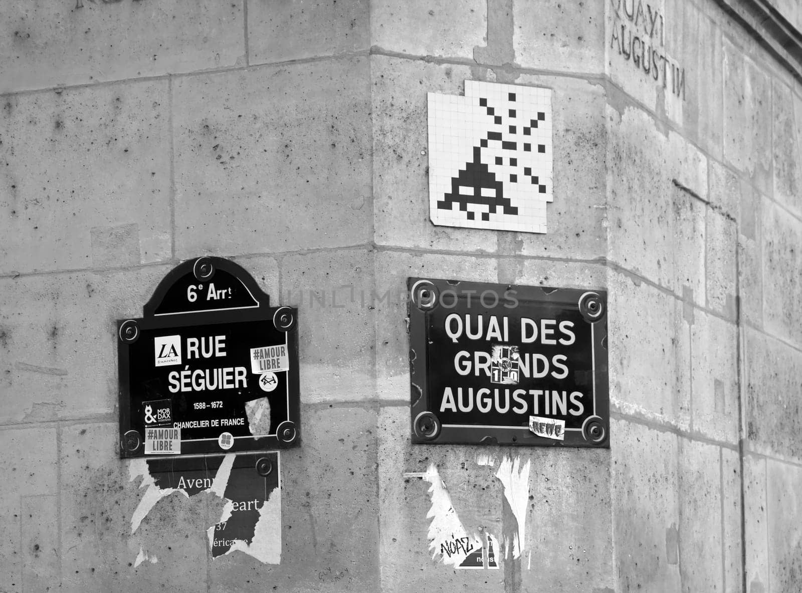 Street art. Mosaic. Rue Séguier and quai des grands Augustins Paris 6 th arrondissement. Black and white.