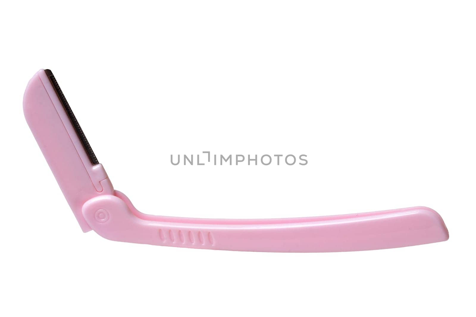 Cosmetic tools. Close-up of a pink eyebrow razor isolated on a white background. Beauty concept. Macro.