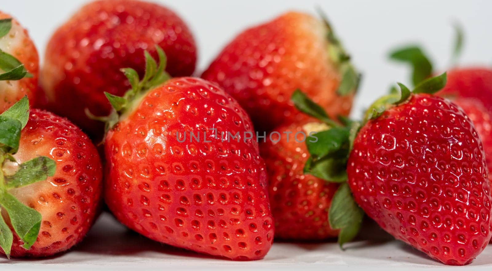 a close up of fresh strawberry