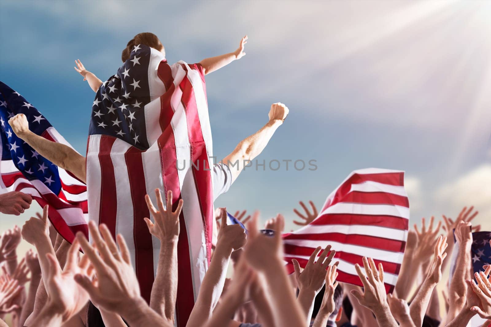 Fourth Of July Celebration. Little Girl Sitting On Dads Shoulders
