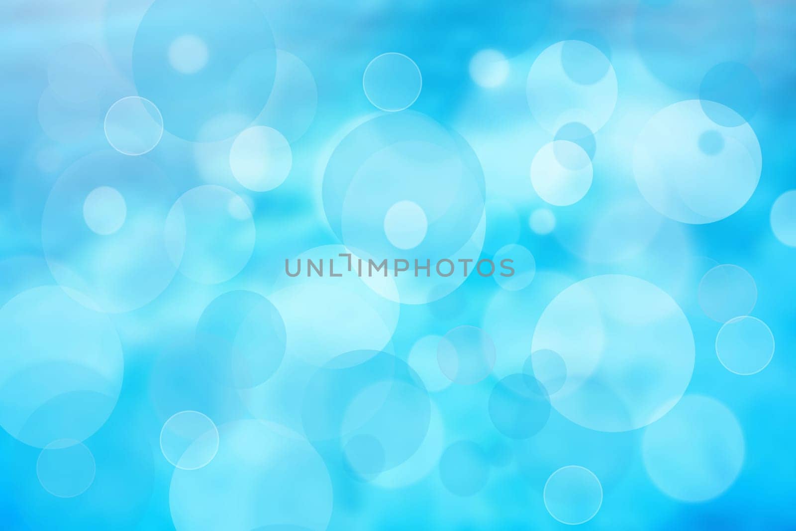 Abstract blurred fresh vivid spring summer light delicate pastel blue white bokeh background texture with bright circular soft color lights. Card concept. Beautiful backdrop illustration.