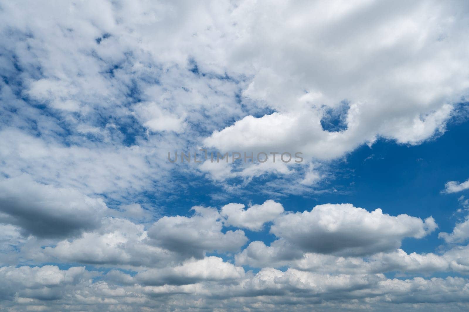 White Cumulus Clouds On Blue Sky, beautiful weather can use as backgrounds