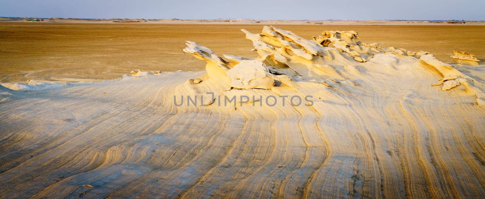 Sandstone formations in Abu Dhabi desert in United Arab Emirates
