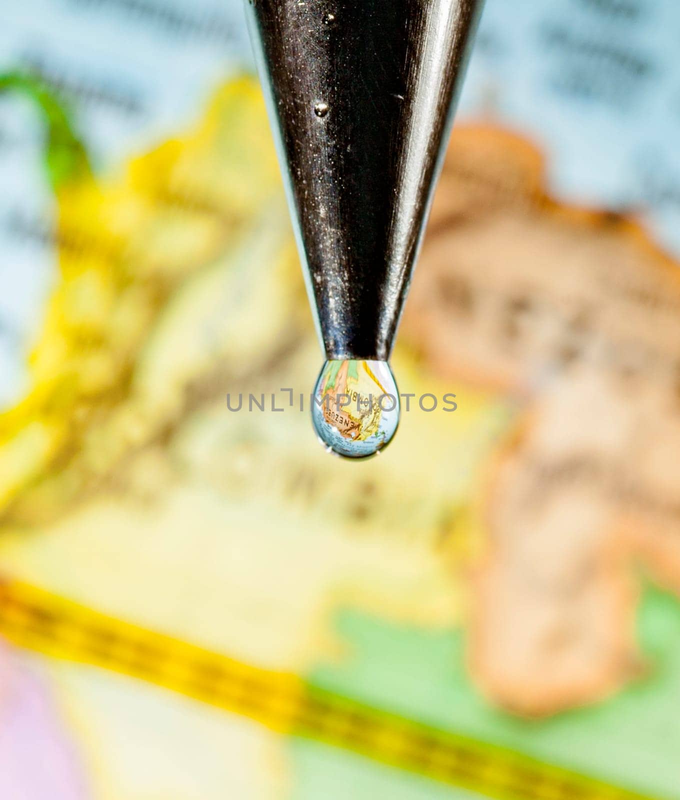 Africa can be seen through drops of water from a faucet