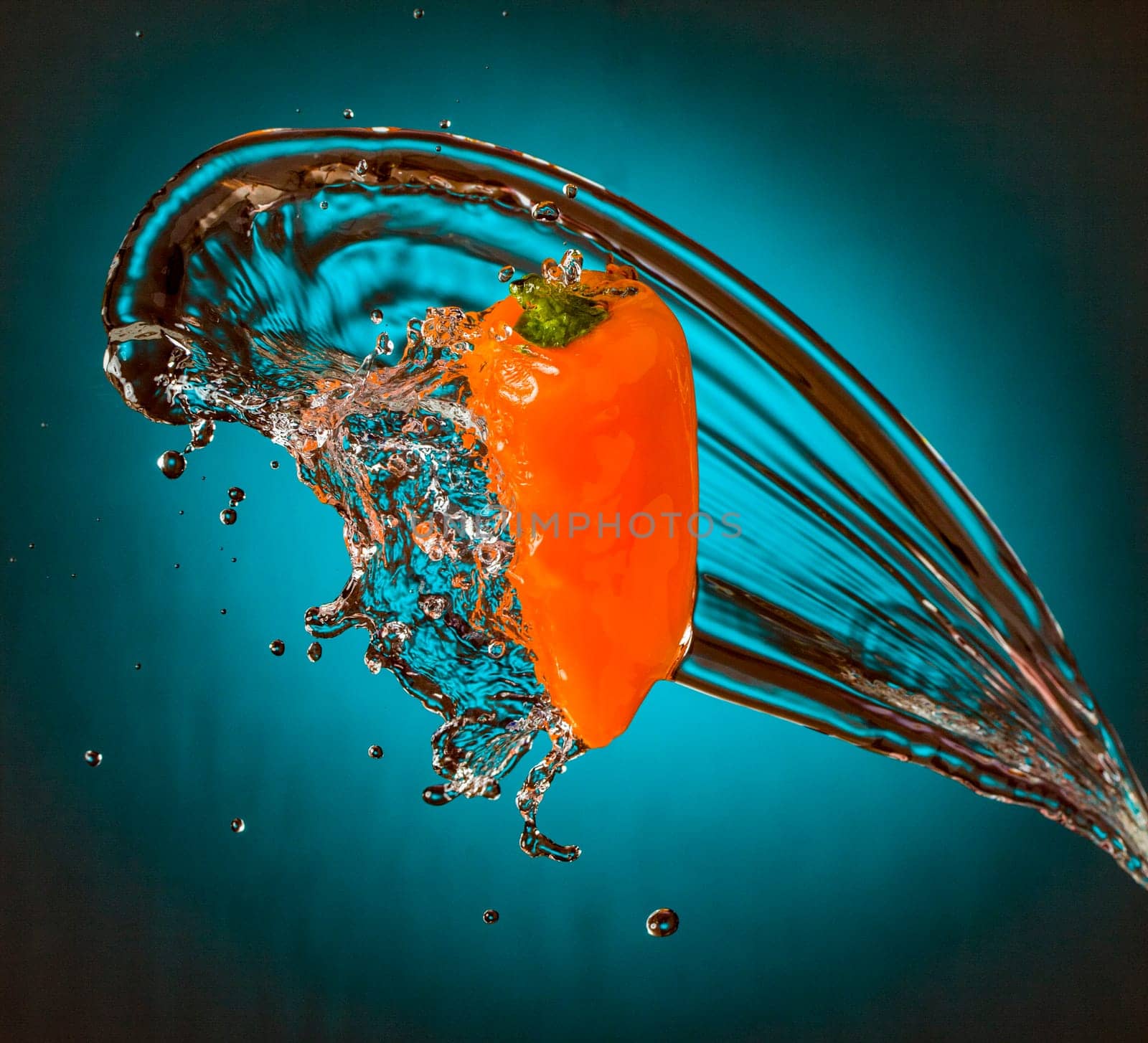 Water Splashing on Orange Mini Pepper