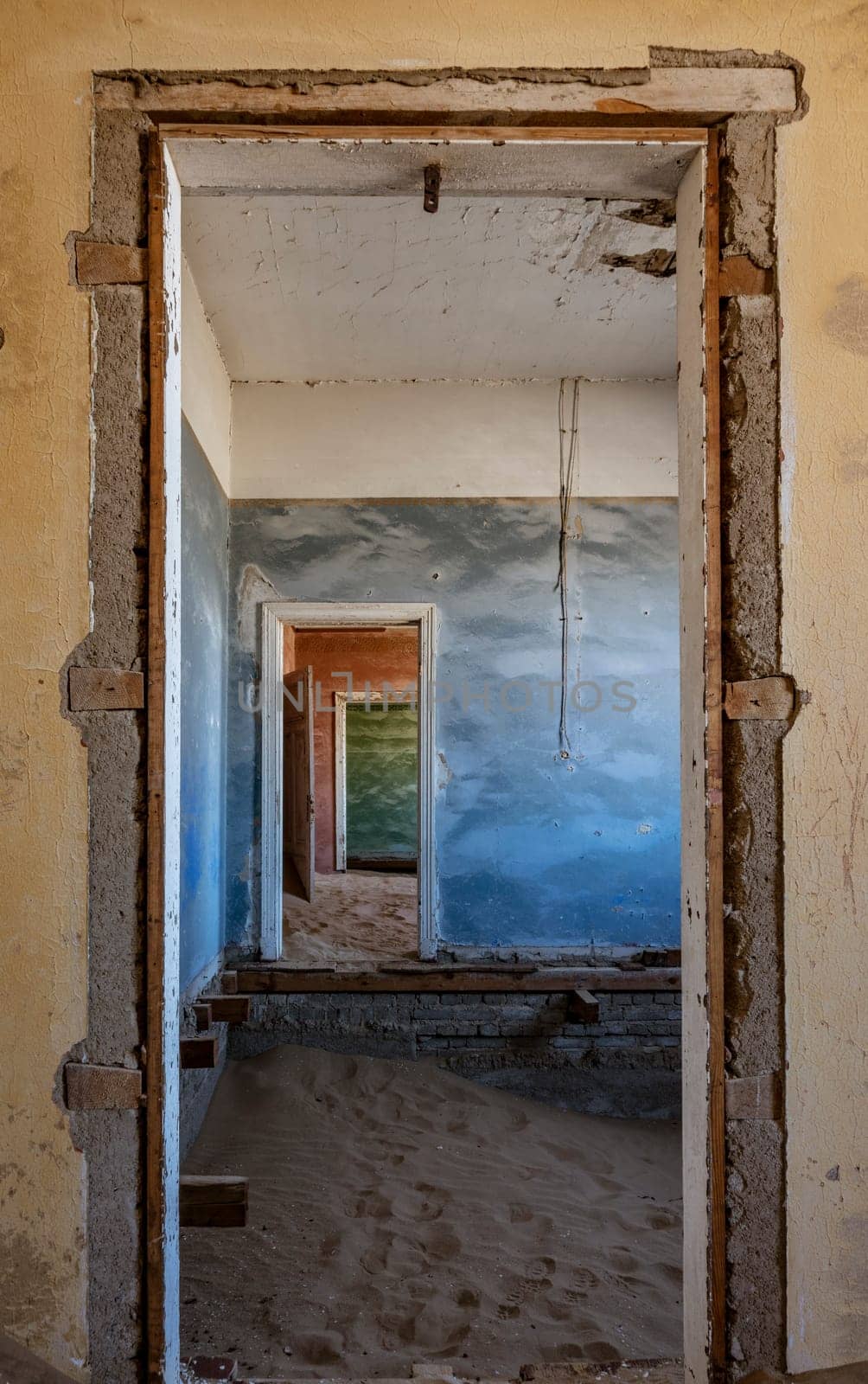 Sand has invaded and taken over these rooms in Kolmanskoppe, Namibia
