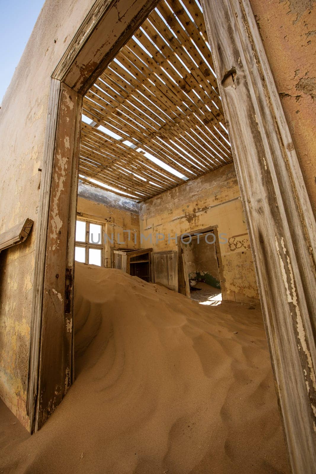 Sand has invaded and taken over these rooms in Kolmanskoppe, Namibia
