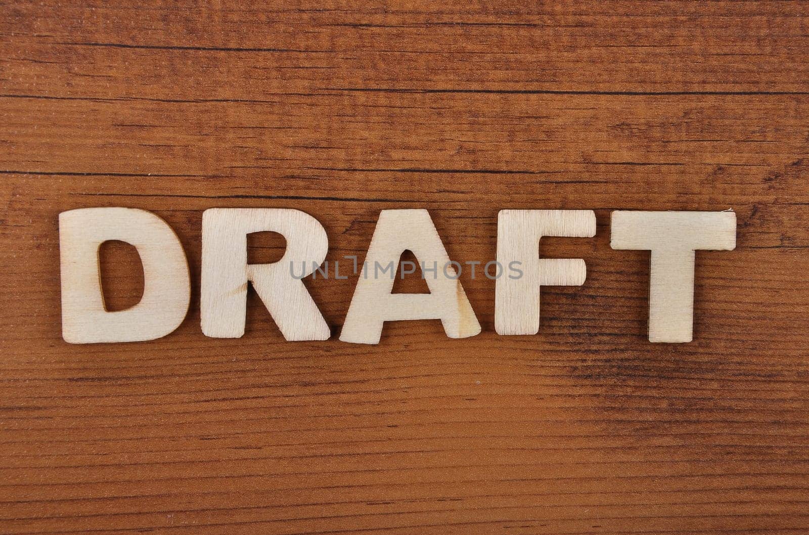 Term from wooden letters on old wooden board