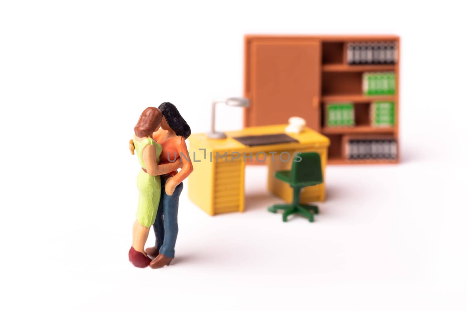 Miniature Lesbian Female Gay Couple, Two tiny Women Kissing Each other, Concept of Homosexual Relationship.
