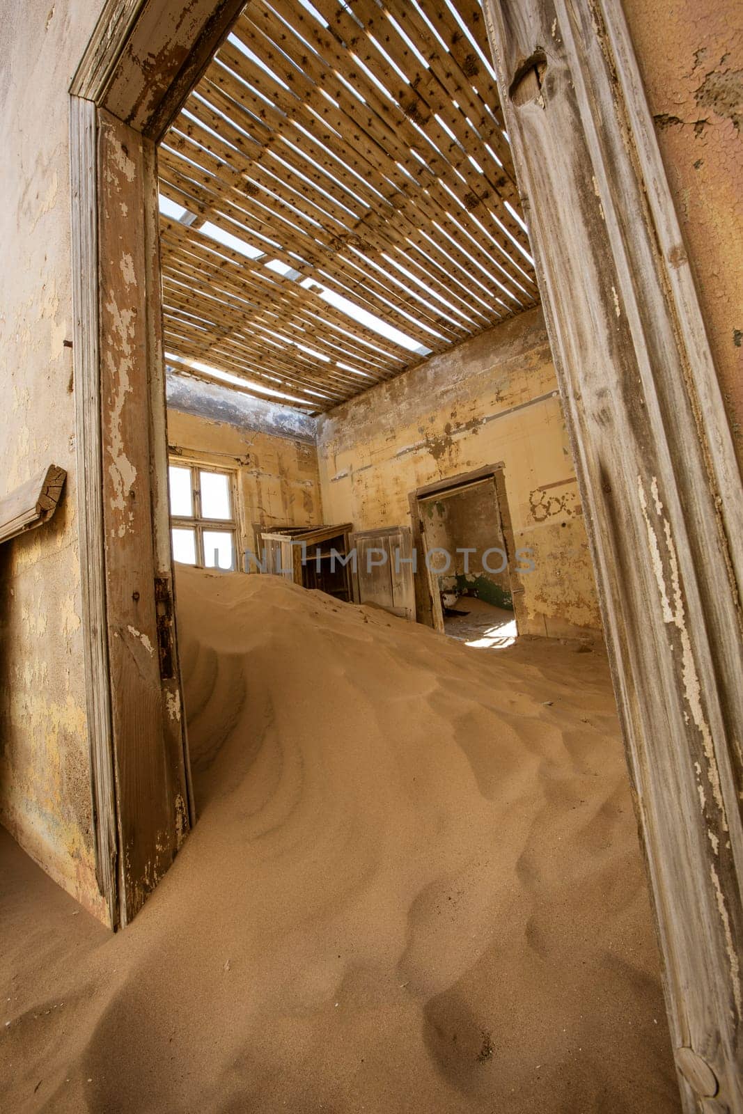 Sand has invaded and taken over these rooms in Kolmanskoppe, Namibia