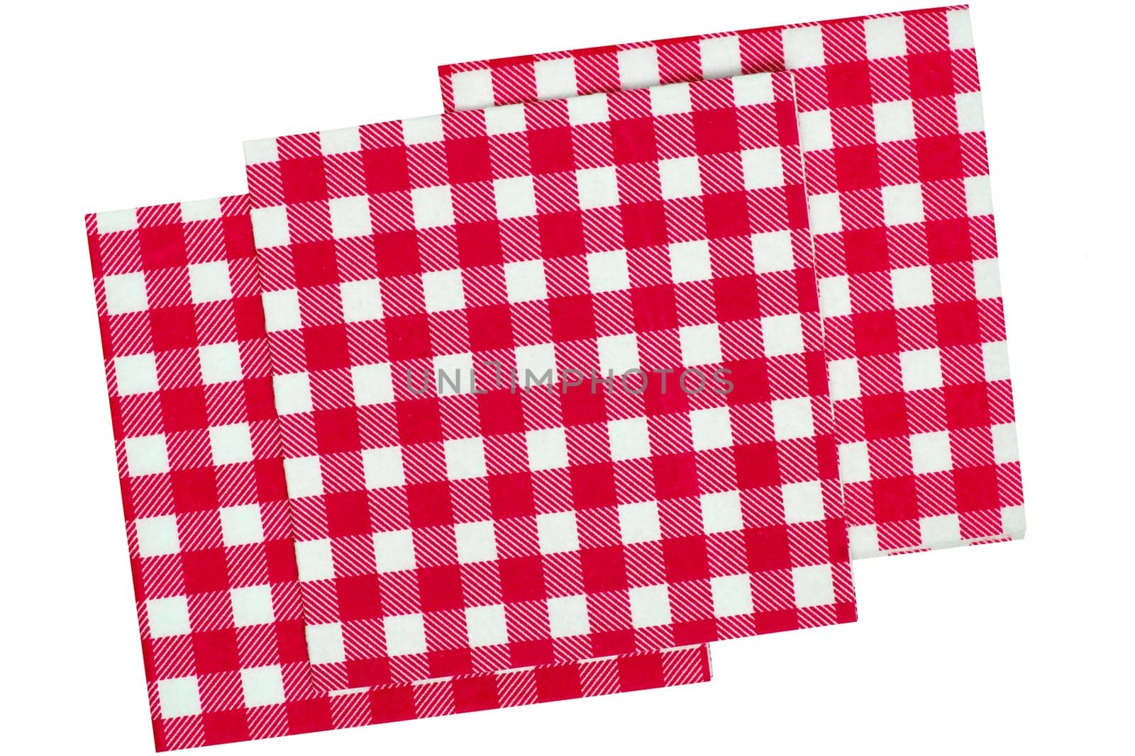 Closeup of a set of red and white checkered kitchen cloth or napkin isolated on white background. Kitchen accessories. Macro.