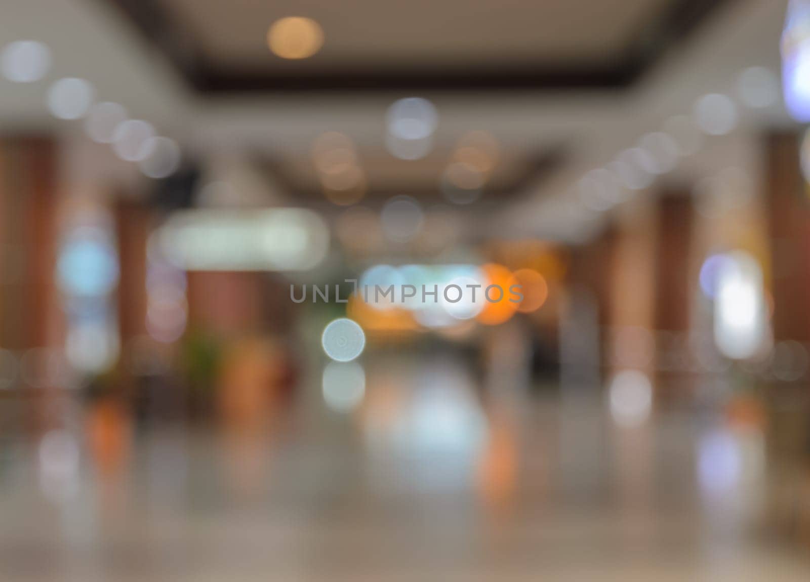 Defocused image of office, airport, hospital or shopping mall building corridor background