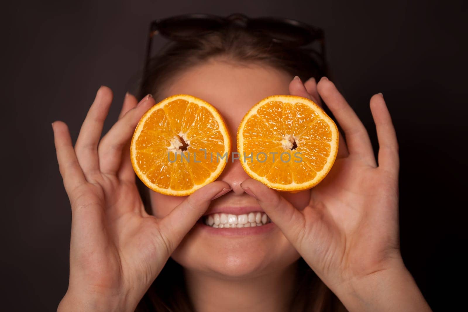 Girl with oranges in the eyes