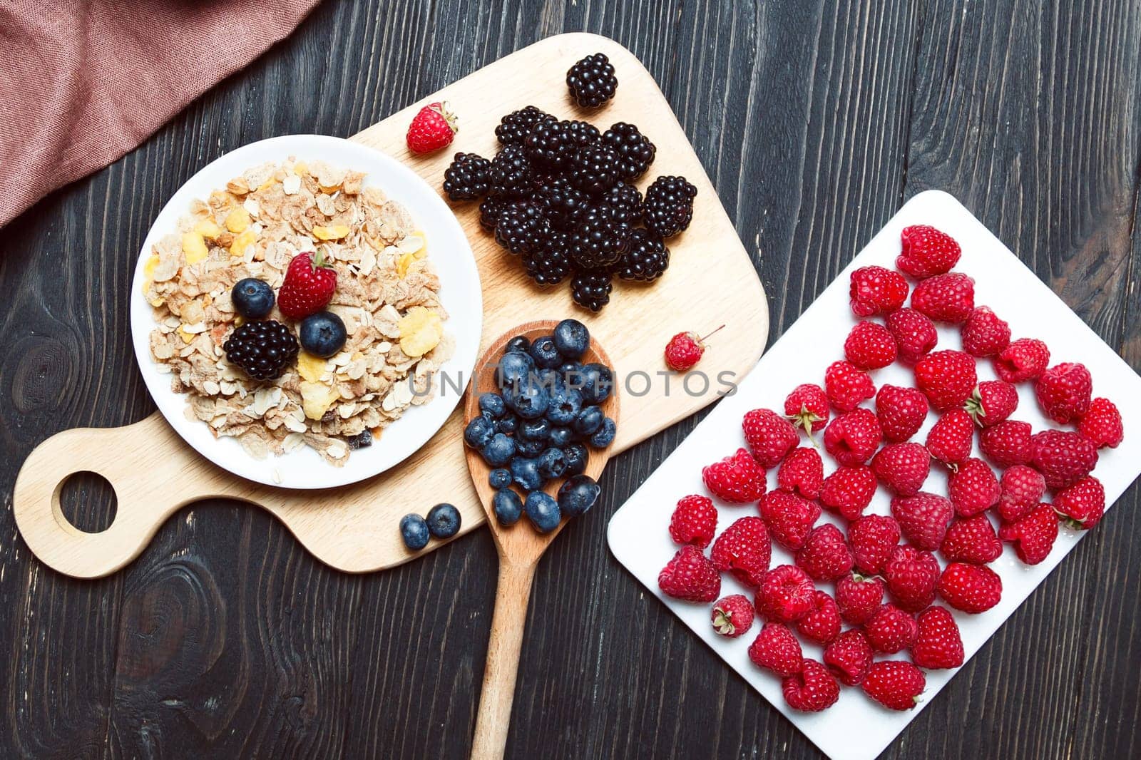 Cereal. Breakfast with muesli and berries. Top view