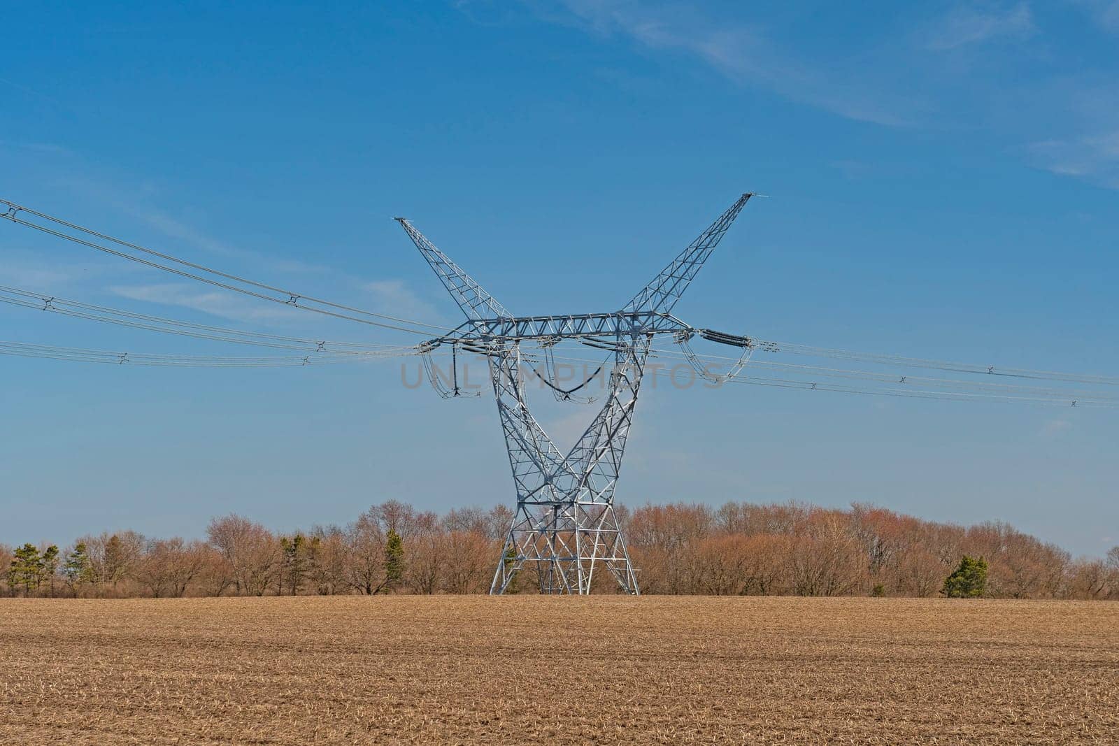 High Power Transmission LInes and Tower in a Remote Farmland in Midewin National Tallgrass Prairie in Wilmington, Illinois