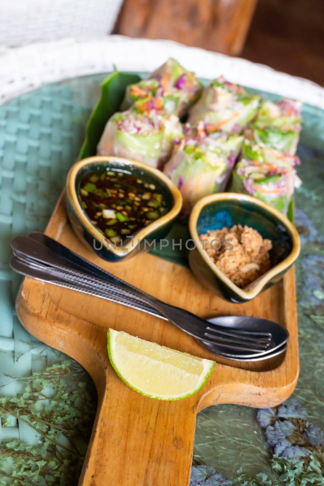 Healthy fresh vegetable spring rolls serving, stock photo