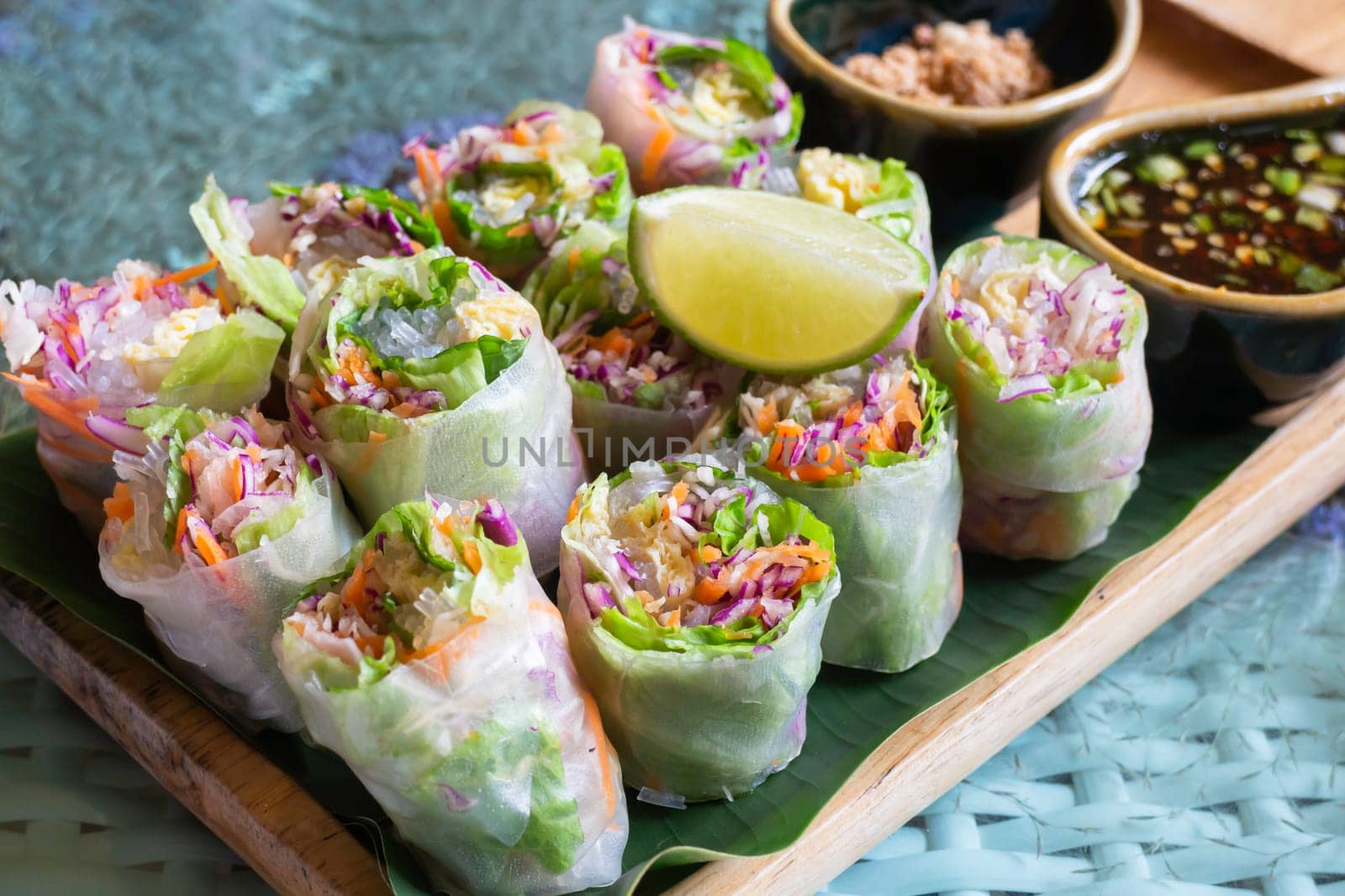 Healthy fresh vegetable spring rolls serving, stock photo