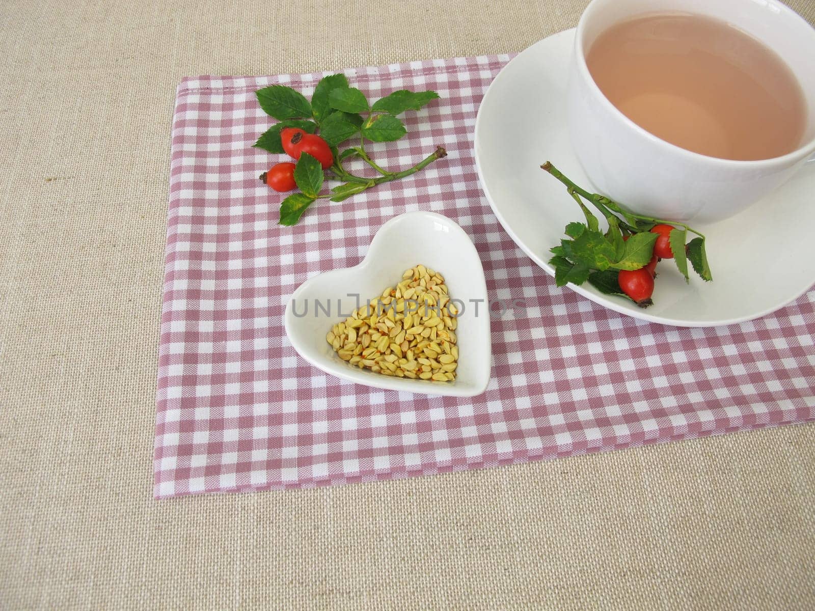 A cup of kernels tea from rose hip seeds